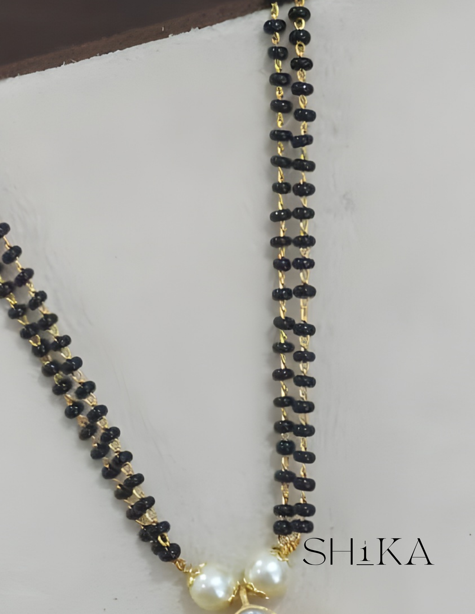 Jadau Kundan Nalla Pusalu Necklace
