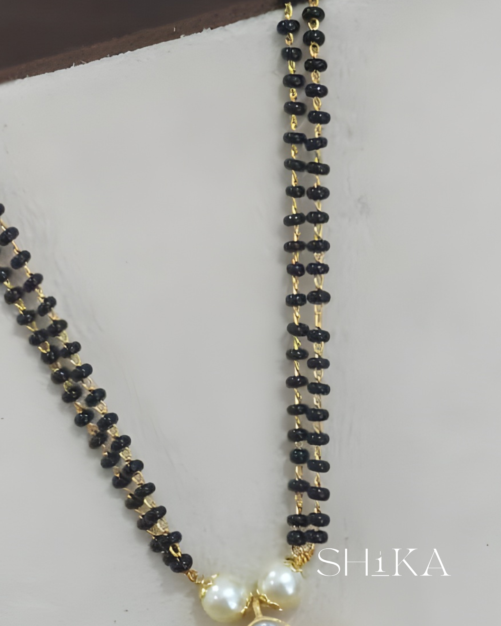 Jadau Kundan Nalla Pusalu Necklace