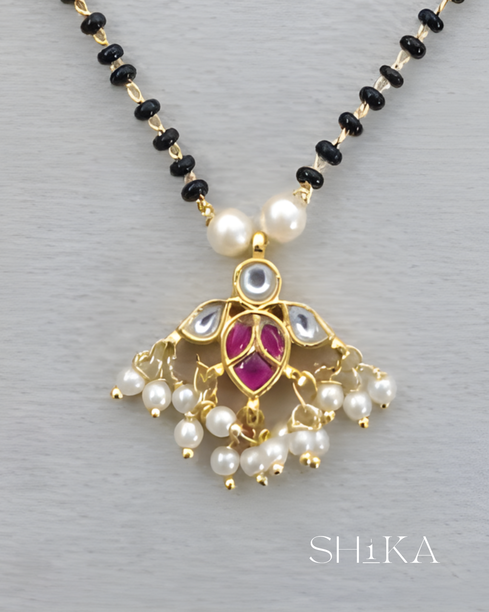Bird Pendant Nalla Pusalu Necklace