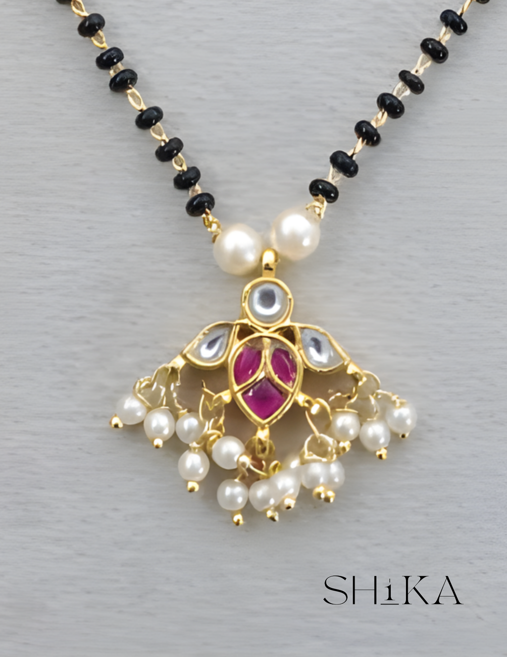 Bird Pendant Nalla Pusalu Necklace